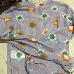 purple mesh shirt with flowers